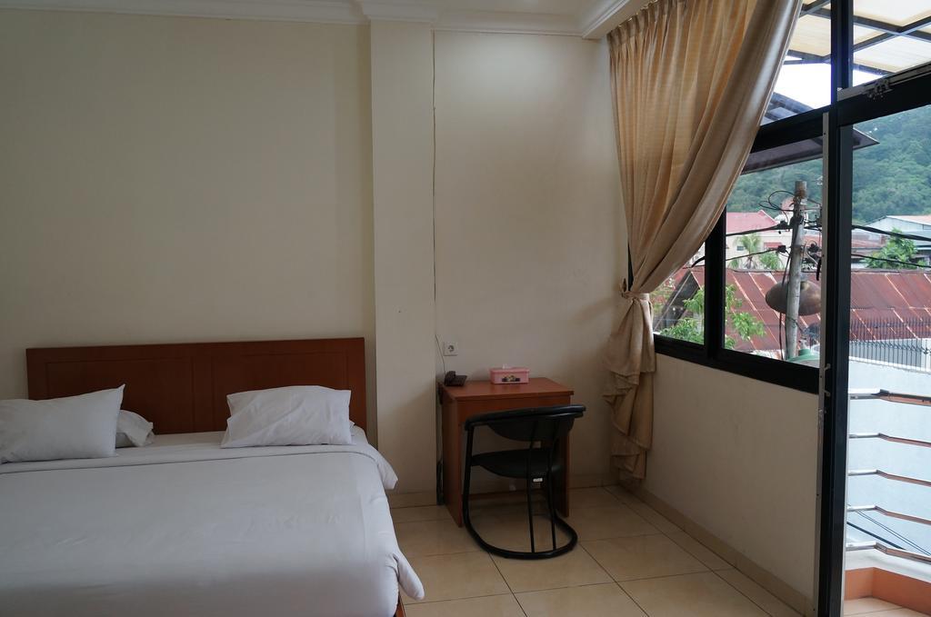 Jesnic Hotel Padang  Rom bilde